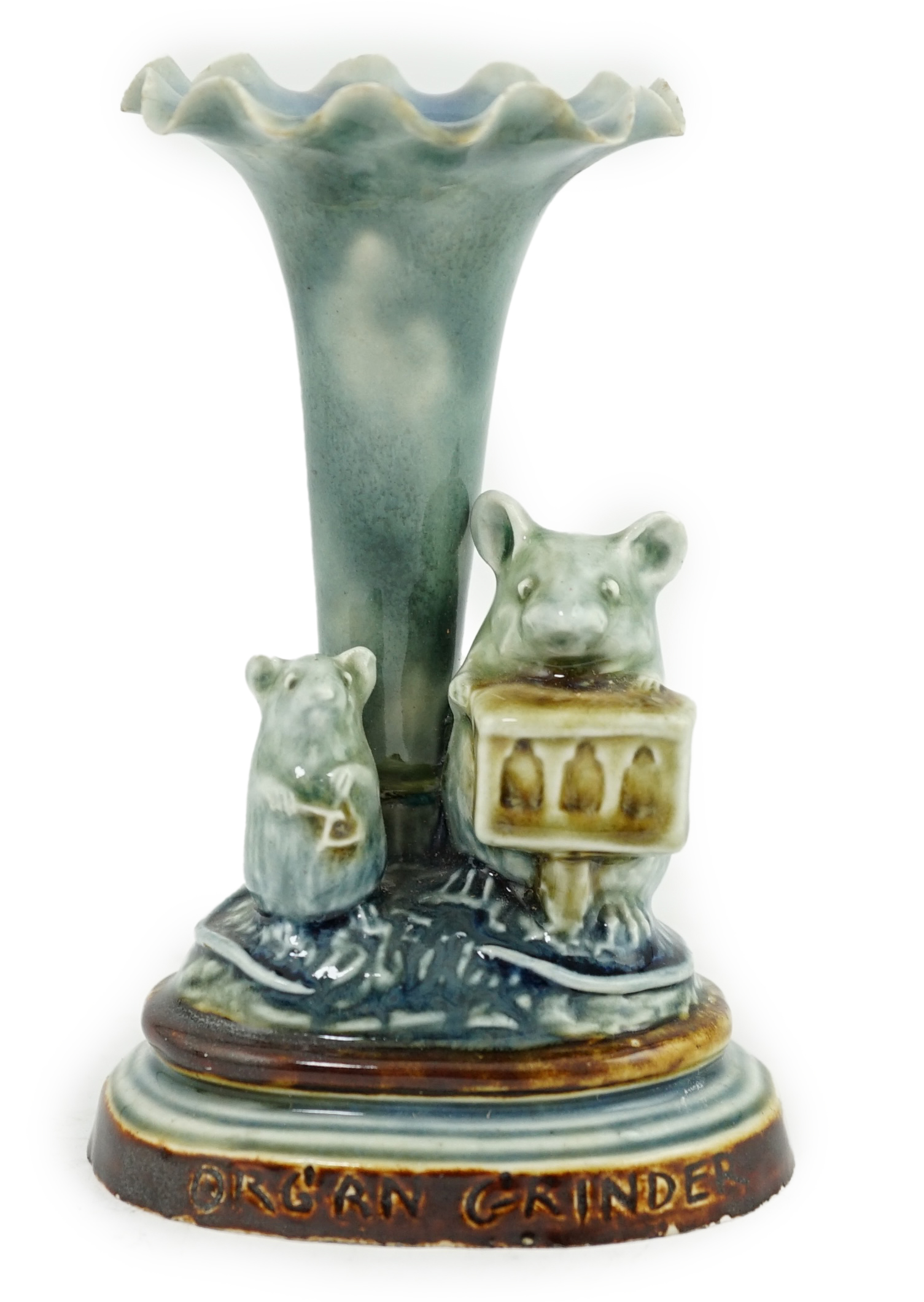 George Tinworth for Doulton Lambeth, an ‘organ grinder’ spill vase, c.1890